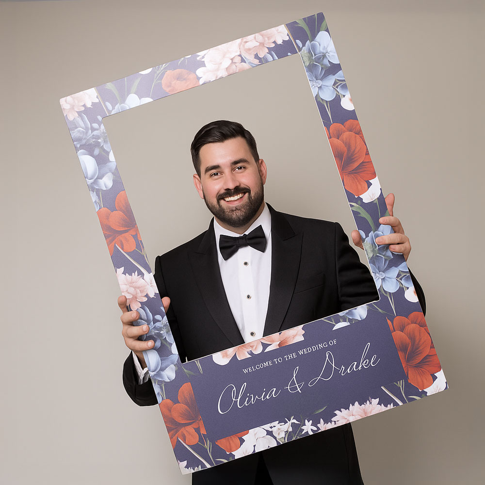 Man in a Tuxedo Holding a Selfie Frame