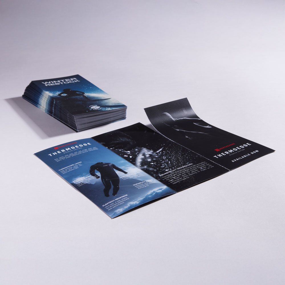 DL Perforated C-Fold Folded Leaflet Stack and Partly Torn